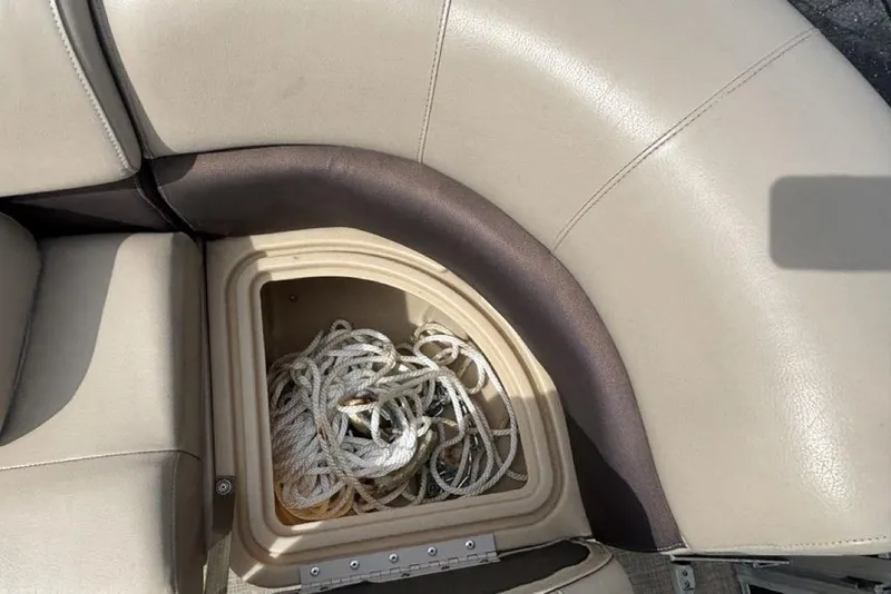 Slide: The Image of Storage compartment with rope on a 2019 Sun Tracker Party Barge 22 RF DLX boat. - 12