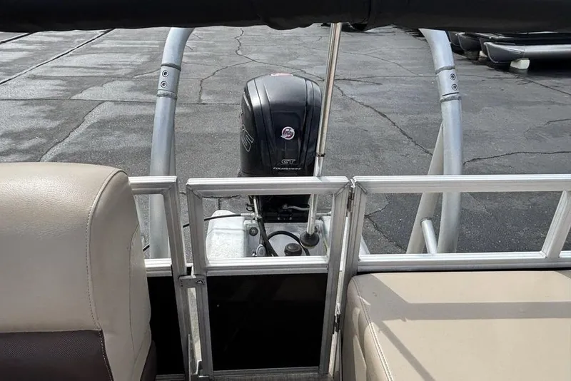 Slide: The Image of 2019 Sun Tracker Party Barge 22 RF DLX with outboard motor, rear seating view. - 27