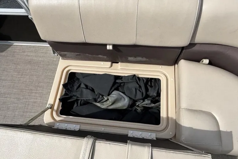 Slide: The Image of Storage compartment in 2019 Sun Tracker Party Barge 22 RF DLX pontoon boat seat. - 11