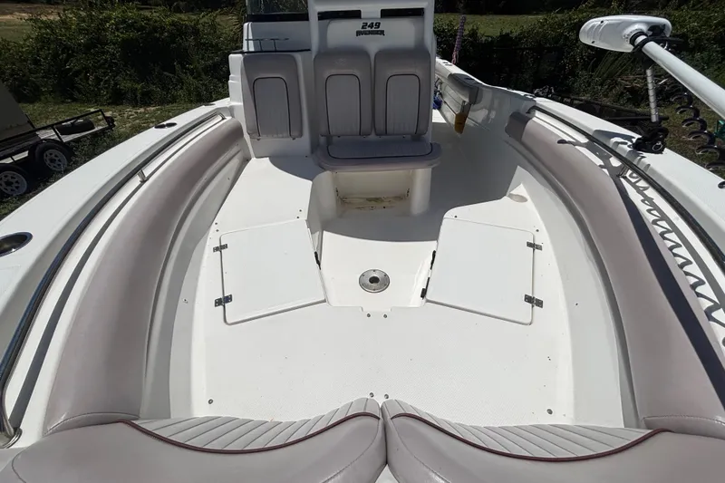Slide: The Image of 2016 Sea Fox 249 Avenger boat interior with seating and storage compartments. - 66