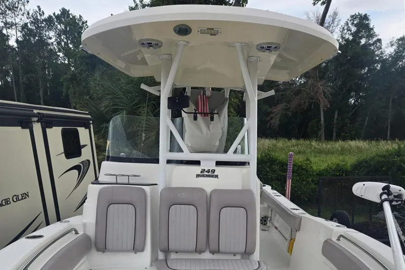 Slide: The Image of The image shows the cockpit of a 2016 Sea Fox 249 Avenger boat with gray seating. - 7