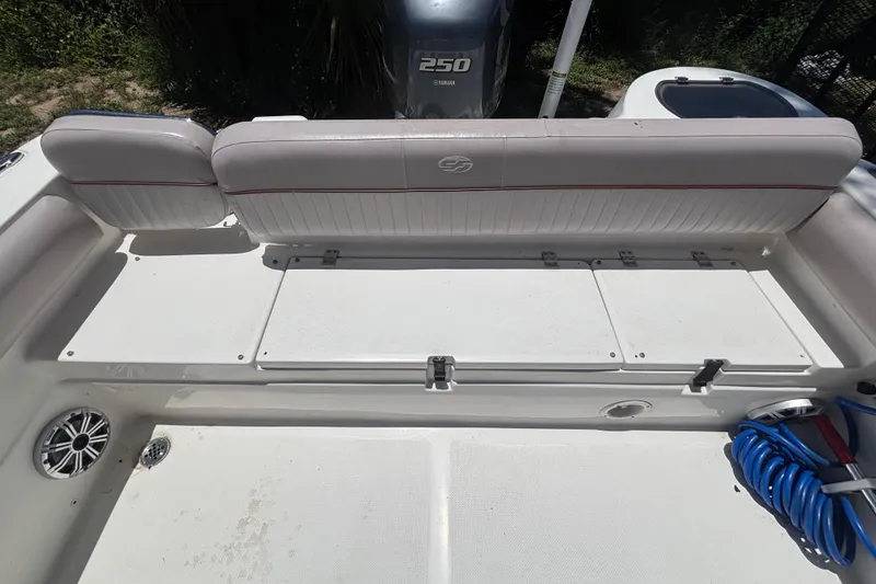 Slide: The Image of 2016 Sea Fox 249 Avenger boat interior with seating and Yamaha 250 engine. - 76