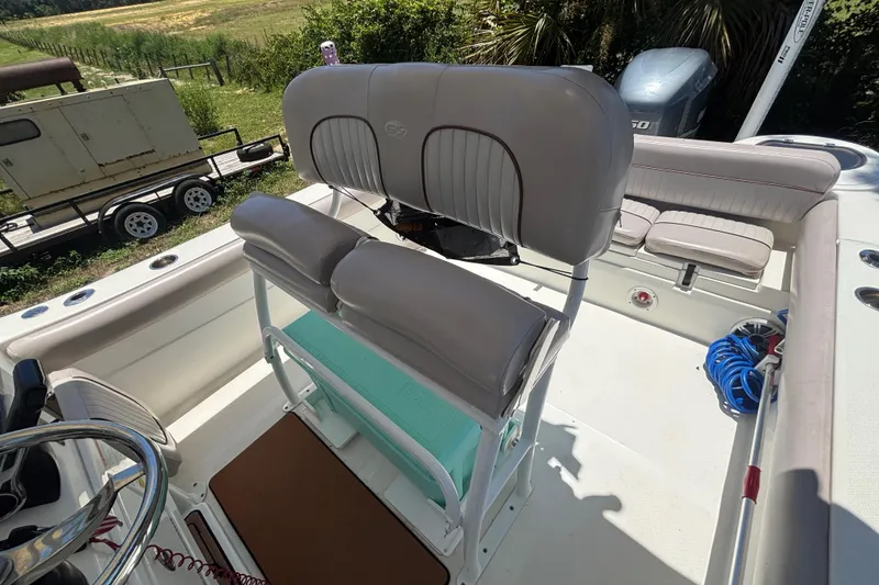 Slide: The Image of 2016 Sea Fox 249 Avenger boat interior with seating and steering wheel. - 70