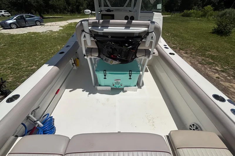 Slide: The Image of 2016 Sea Fox 249 Avenger boat interior with seating and storage. - 15