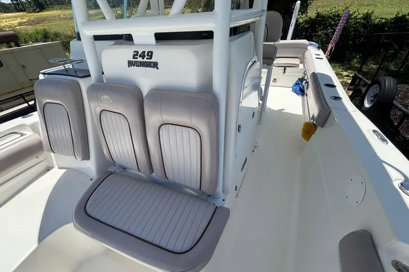 Slide: The Image of 2016 Sea Fox 249 Avenger boat interior with seating and storage compartments. - 69
