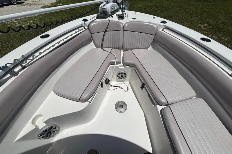 Slide: The Image of 2016 Sea Fox 249 Avenger boat interior with cushioned seating and speaker system. - 50