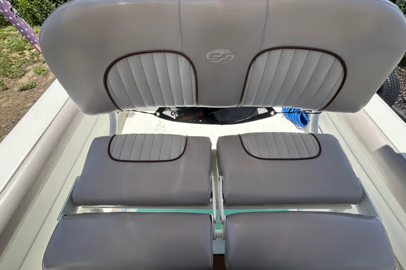 Slide: The Image of 2016 Sea Fox 249 Avenger boat seating with gray upholstery and stylish design. - 72