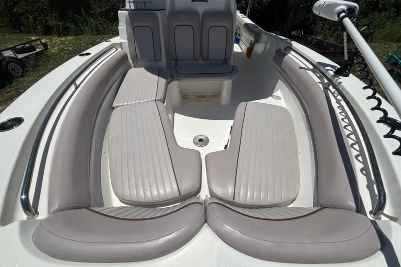 Slide: The Image of 2016 Sea Fox 249 Avenger boat interior with cushioned seating and stainless steel railings. - 57