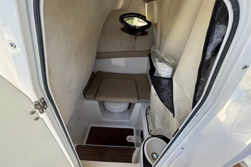 Slide: The Image of 2016 Sea Fox 249 Avenger cabin interior with seating and storage. - 42