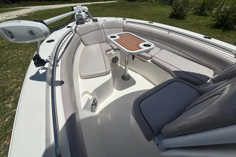 Slide: The Image of 2016 Sea Fox 249 Avenger boat interior with seating and table, showcasing comfort and style. - 49