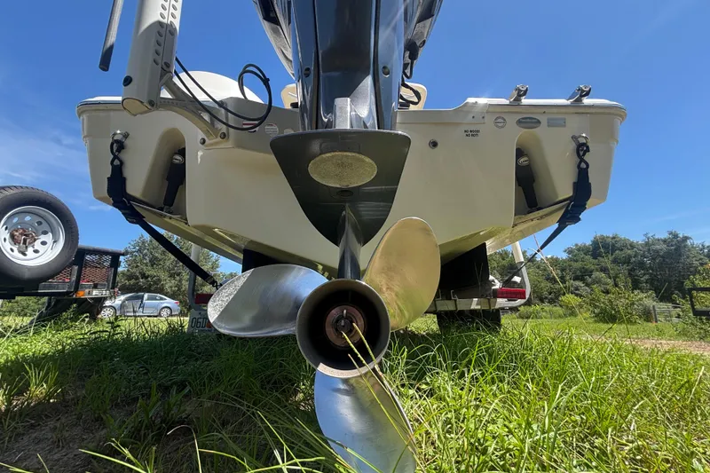 Slide: The Image of Rear view of a 2016 Sea Fox 249 Avenger boat on a trailer, showing the propeller. - 6