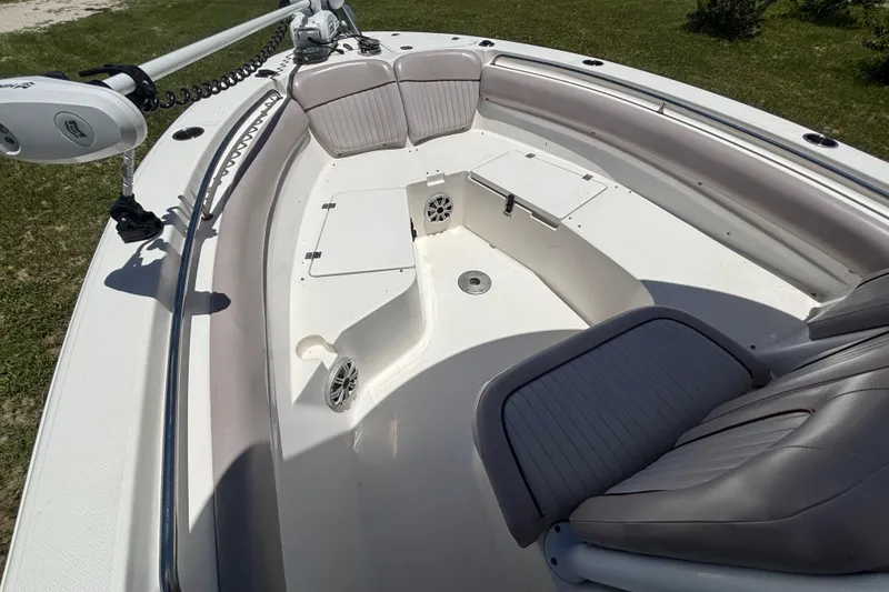 Slide: The Image of 2016 Sea Fox 249 Avenger boat interior with seating and storage compartments. - 59