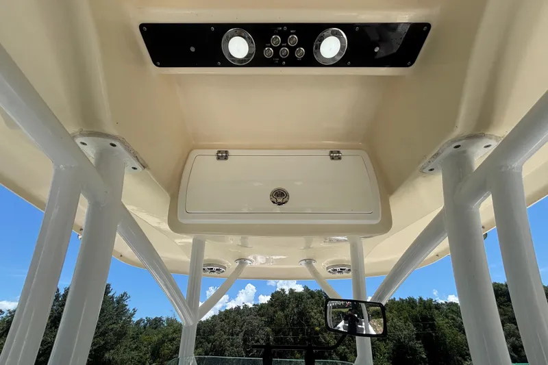 Slide: The Image of 2016 Sea Fox 249 Avenger boat console with storage compartment and control panel. - 30