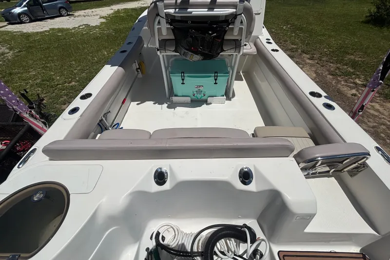 Slide: The Image of 2016 Sea Fox 249 Avenger boat interior with seating and storage compartments. - 14