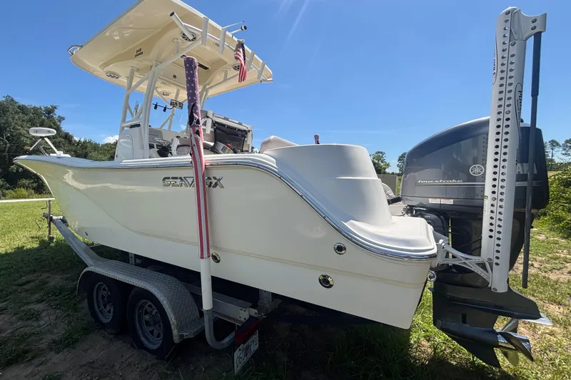 Slide: The Image of 2016 Sea Fox 249 Avenger boat on trailer with Yamaha outboard motor. - 9