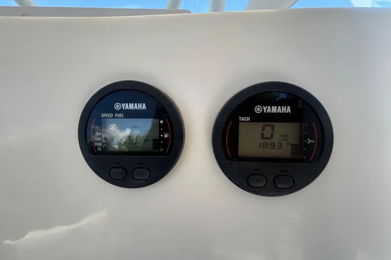 Slide: The Image of Yamaha speed and tachometer gauges on a 2016 Sea Fox 249 Avenger boat dashboard. - 25