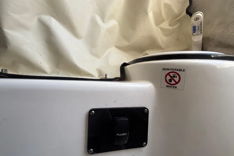 Slide: The Image of Interior of 2016 Sea Fox 249 Avenger boat with non-potable water warning sign. - 48