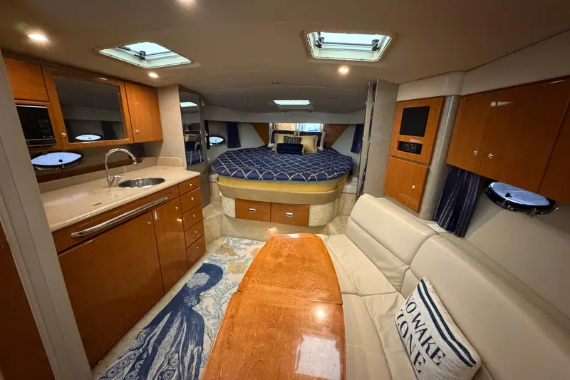 Slide: The Image of Luxurious interior of a 2004 Formula 34 Performance Cruiser with modern amenities. - 20