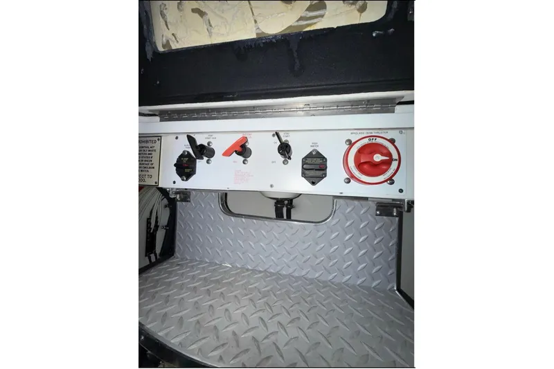 Slide: The Image of Control panel of a 2004 Formula 34 Performance Cruiser with diamond plate flooring. - 39