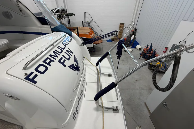 Slide: The Image of 2004 Formula 34 Performance Cruiser in storage, featuring "Formulated Fun" branding. - 6