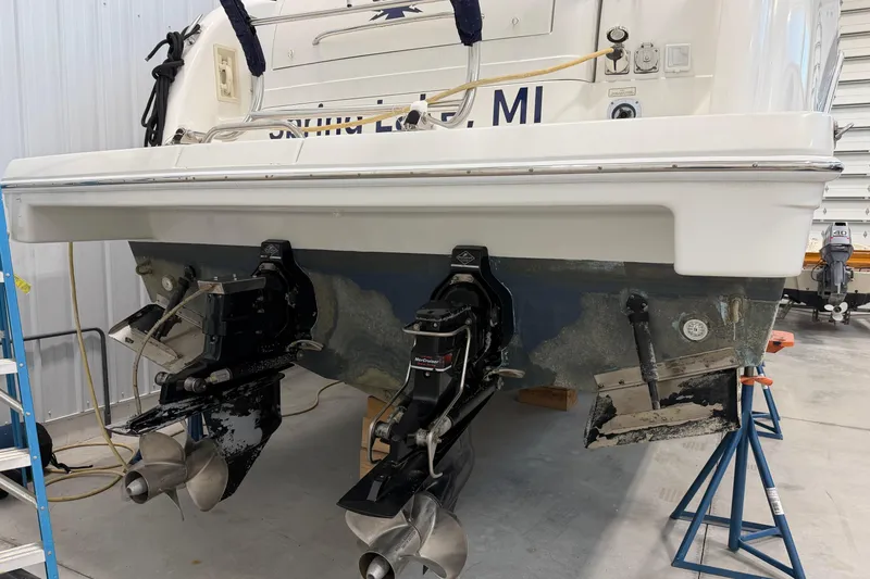Slide: The Image of 2004 Formula 34 Performance Cruiser in a garage, showing dual propellers and stern details. - 33