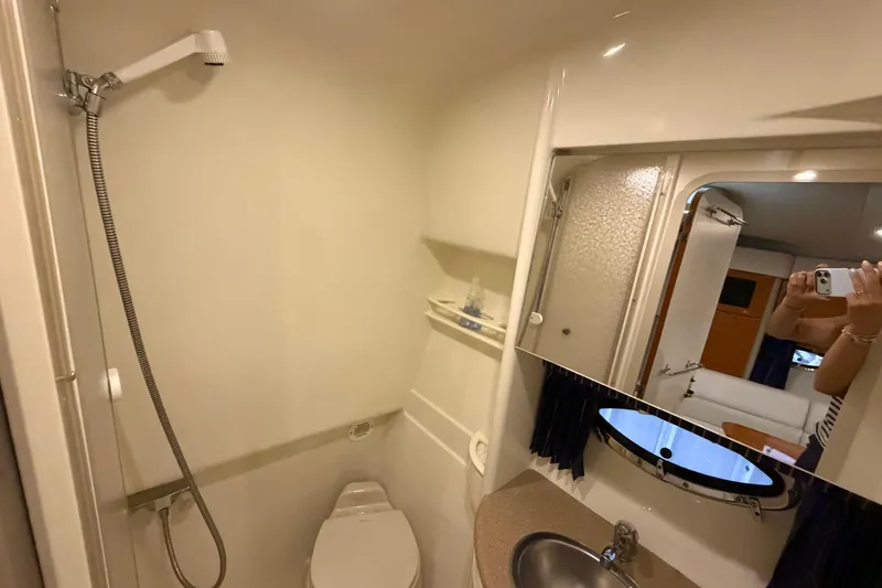 Slide: The Image of Bathroom interior of a 2004 Formula 34 Performance Cruiser with shower and sink. - 29