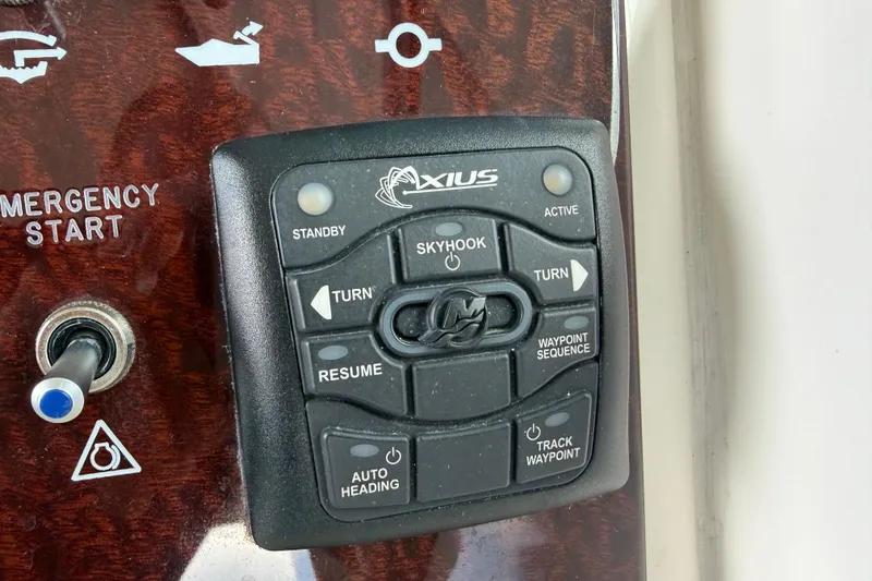 Slide: The Image of Control panel of a 2012 Sea Ray Sundancer 310 boat with Axius joystick system. - 17