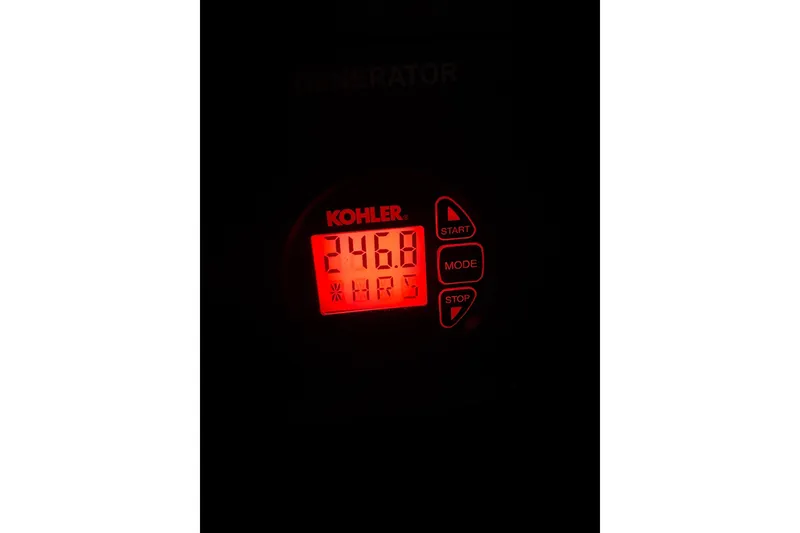 Slide: The Image of Kohler generator display showing 246.8 hours on a 2012 Sea Ray Sundancer 310. - 33