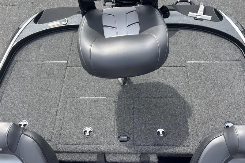Slide: The Image of 2018 Nitro Z19 Pro boat interior with gray seating and carpeted deck. - 26