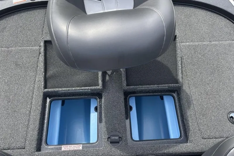 Slide: The Image of 2018 Nitro Z19 Pro boat interior with storage compartments and cushioned seat. - 22