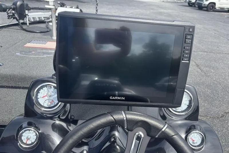 Slide: The Image of Garmin display on 2018 Nitro Z19 Pro boat dashboard with gauges and steering wheel. - 21