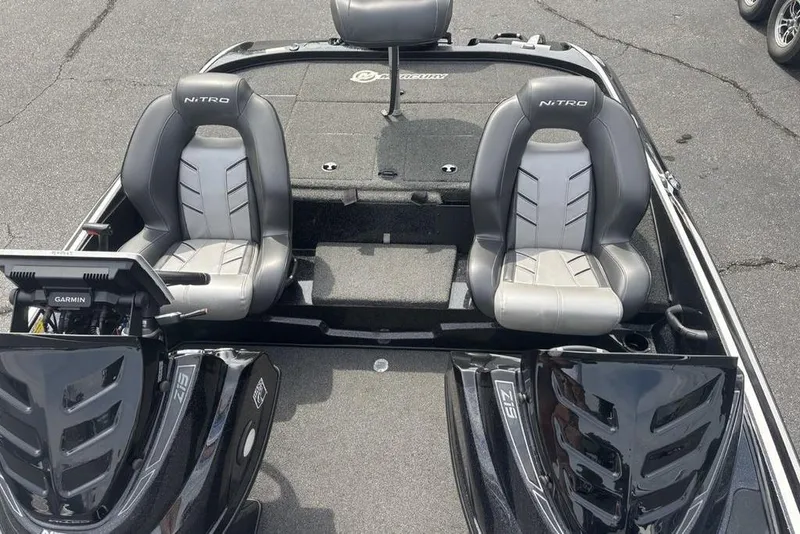 Slide: The Image of 2018 Nitro Z19 Pro boat interior with dual seats and Garmin navigation system. - 11