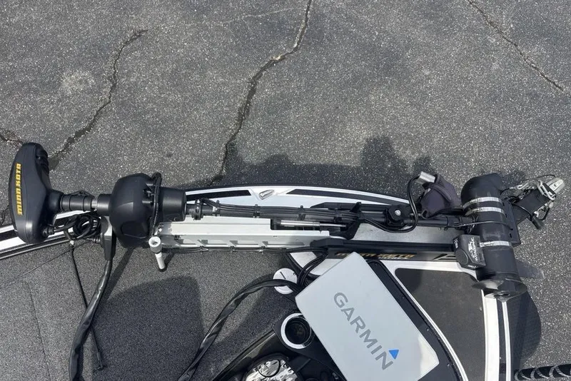 Slide: The Image of 2018 Nitro Z19 Pro boat with Garmin equipment and Minn Kota trolling motor on asphalt. - 18