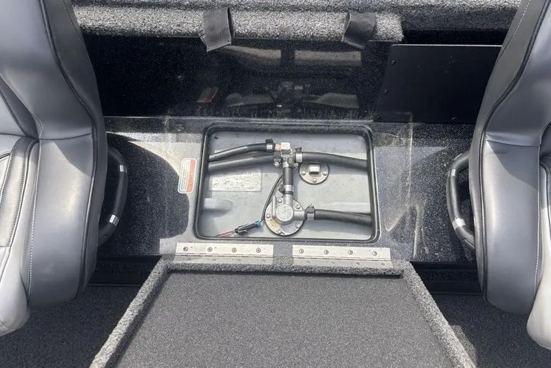 Slide: The Image of 2018 Nitro Z19 Pro boat interior with seating and storage compartment. - 23