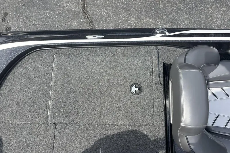 Slide: The Image of 2018 Nitro Z19 Pro boat deck with gray carpet and seating. - 29