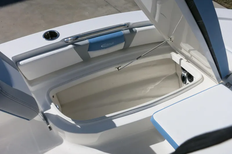 Slide: The Image of Open storage compartment on 2026 Robalo 206 Cayman boat, featuring sleek design and ample space. - 16