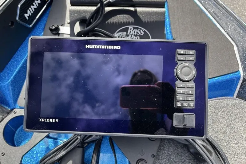 Slide: The Image of Humminbird Xplore 9 fish finder on 2026 Skeeter ZXE20 boat dashboard. - 14