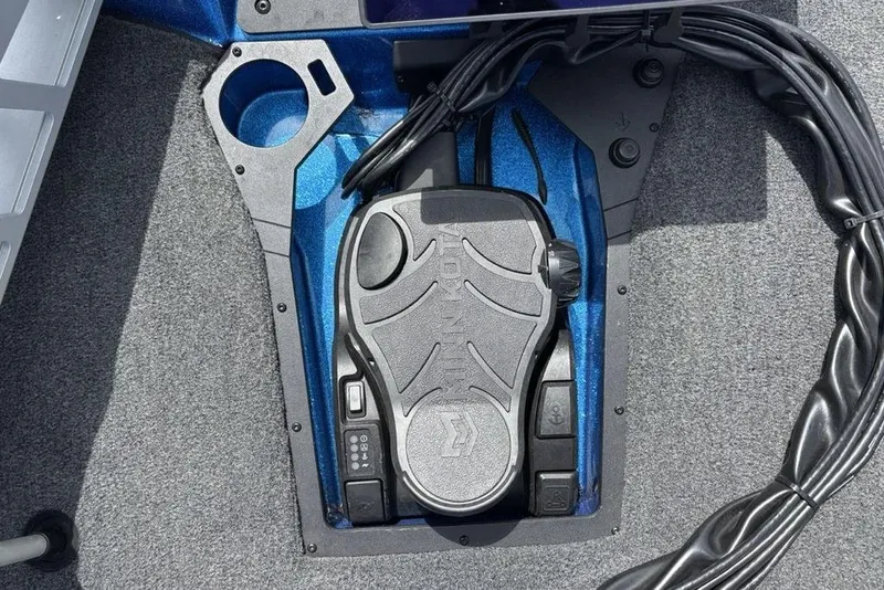 Slide: The Image of Foot pedal control in a 2026 Skeeter ZXE20 boat, featuring a sleek design and wiring. - 10