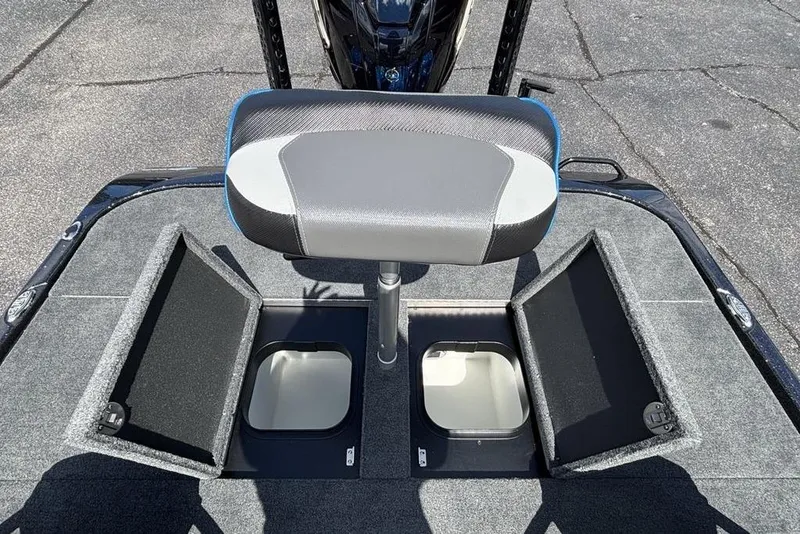 Slide: The Image of 2026 Skeeter ZXE20 boat deck with storage compartments and seat. - 35