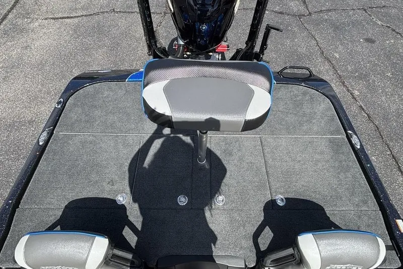 Slide: The Image of 2026 Skeeter ZXE20 boat deck with seating and motor, viewed from above. - 38
