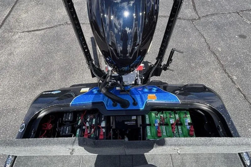 Slide: The Image of Skeeter ZXE20 2026 boat with open battery compartment, showcasing advanced marine technology. - 43