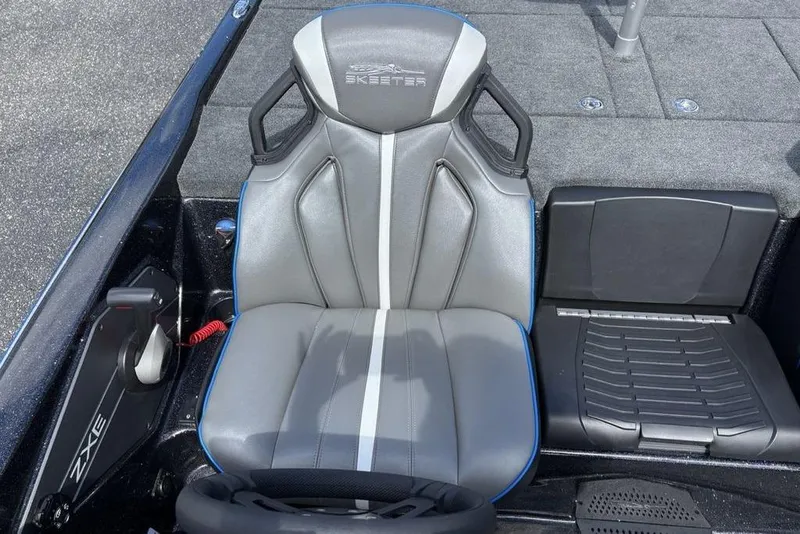 Slide: The Image of 2026 Skeeter ZXE20 boat seat with sleek design and modern upholstery. - 29