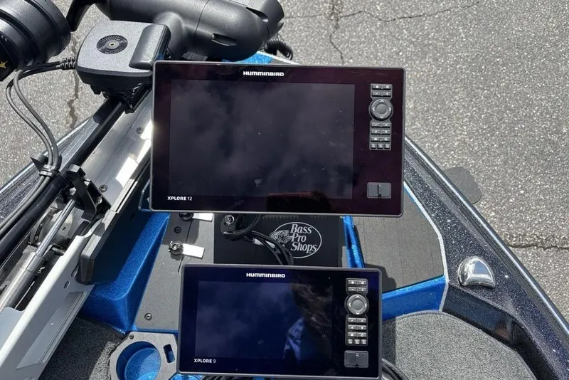 Slide: The Image of Dual Humminbird Xplore displays on a 2026 Skeeter ZXE20 boat dashboard. - 12