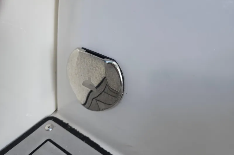 Slide: The Image of Chrome detail on 2021 Yamaha Boats 275SD, showcasing sleek design and craftsmanship. - 19