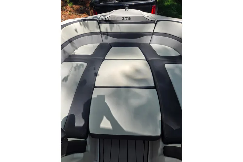 Slide: The Image of 2021 Yamaha Boats 275SD interior seating with sleek design and comfortable upholstery. - 16