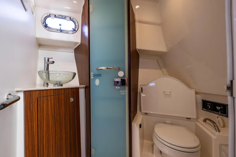 Slide: The Image of Luxurious 2021 Pursuit OS 355 Offshore yacht bathroom with modern fixtures and elegant design. - 8