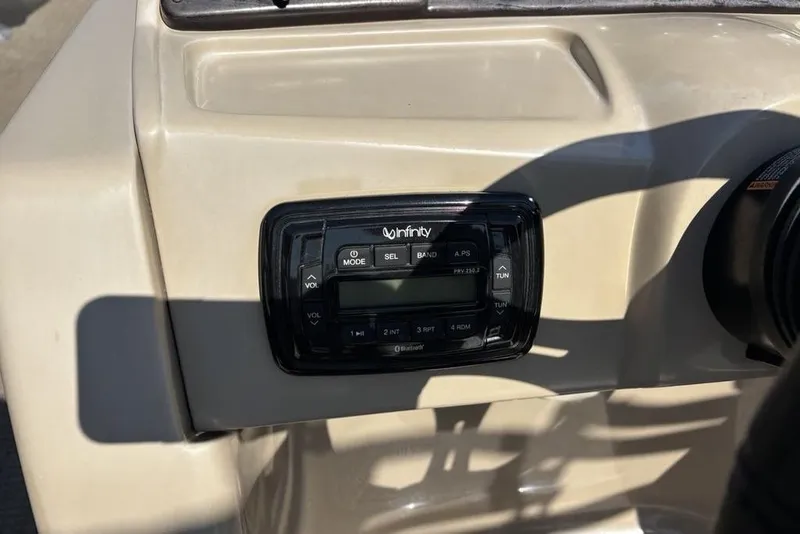Slide: The Image of Infinity stereo system on 2016 SunChaser 8525 boat dashboard. - 11