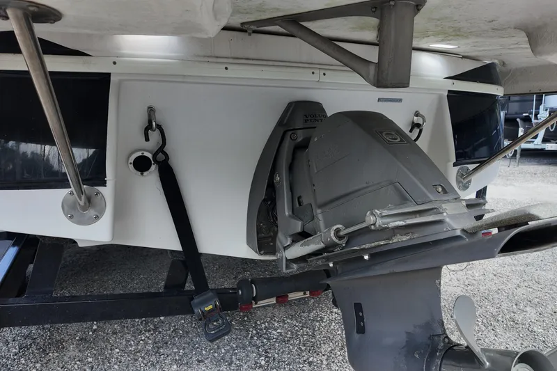 Slide: The Image of Rear view of a 2009 Four Winns F224 boat with Volvo Penta outdrive. - 23