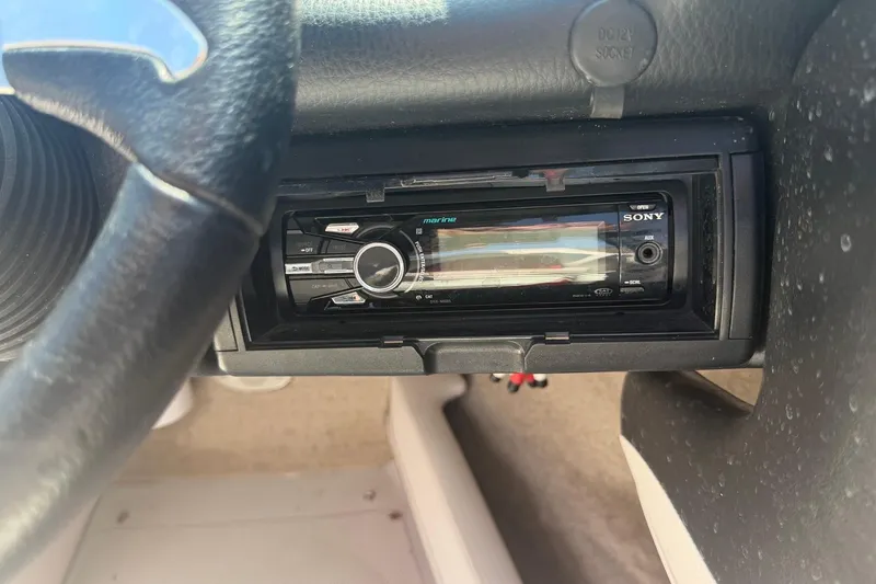 Slide: The Image of Sony marine stereo in a 2013 Crownline 21 SS boat dashboard. - 8