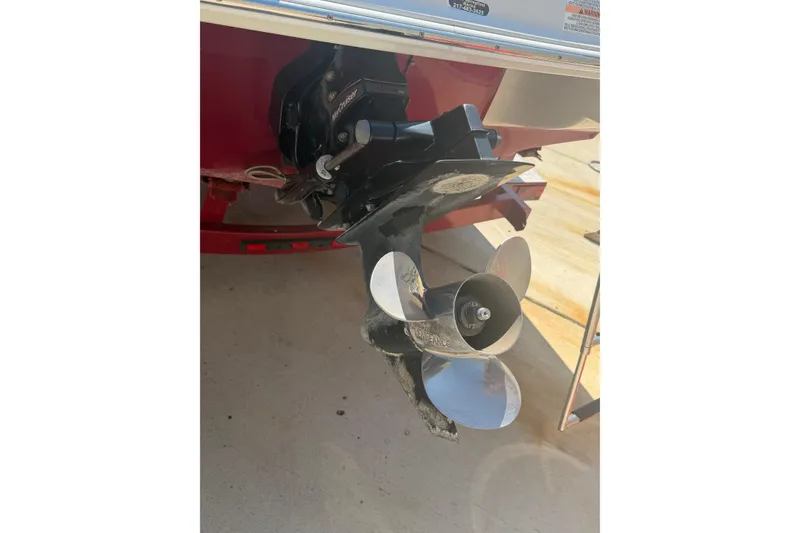 Slide: The Image of Propeller of a 2013 Crownline 21 SS boat on a trailer. - 4